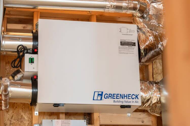 An HVI-certified Greenheck SYNC-180 energy recovery ventilator. ©2024 Visuals by Insignia Studios / courtesy Pro Builder Media.