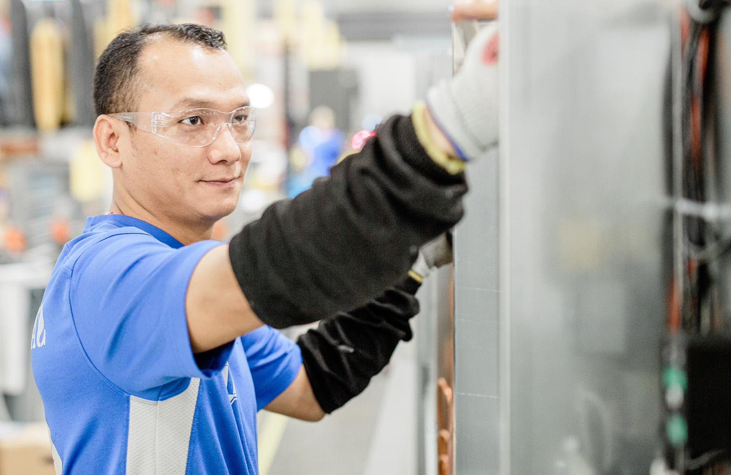 Man working in safety goggles
