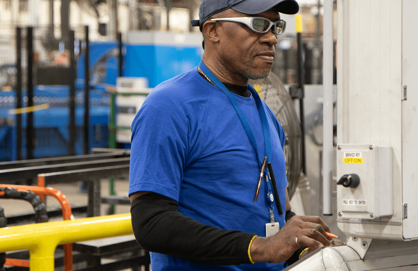 Valent technician performing end-of-line testing on HVAC equipment